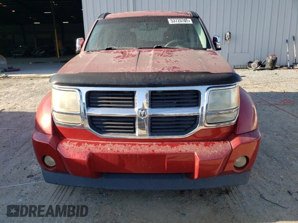 2007 Dodge Nitro SLT z VIN 1D8GU58KX7W569839, wystawiony jako Copart lot #53720705 z przebiegiem 175 746 mil mil oraz Czysty tytuł • Clean title. Historia ofert i sprzedaży dostępna na DreamBid. Obrazek 5.