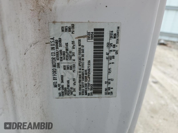 2002 Ford F-150 XL z VIN 1FTRF18W92NB71226, wystawiony jako Copart lot #76082214 z przebiegiem Nie podano mil oraz Szkoda całkowita • Salvage title. Historia ofert i sprzedaży dostępna na DreamBid. Obrazek 12.