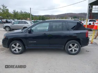 2016 Jeep Compass Latitude with VIN 1C4NJDEB8GD695268, listed as a IAAI auction lot 41724921 with 137,118 mi miles. Bid and sale history available at carsss.com. Image 14.