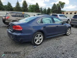 2014 Volkswagen Passat SE with VIN 1VWBT7A36EC095006, listed as a Copart auction lot 63029305 with Not provided miles and Salvage title. Bid and sale history available at DreamBid. Image 3.