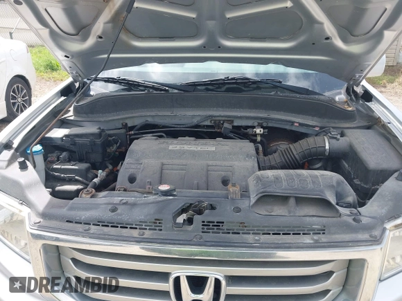 2014 Honda Ridgeline RTL with VIN 5FPYK1F53EB013752, listed as a IAAI auction lot 41886851 with 89,038 mi miles and . Bid and sale history available at DreamBid. Image 10.