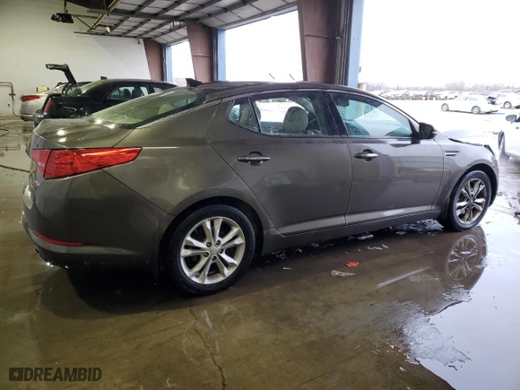 2013 Kia Optima EX with VIN 5XXGN4A79DG253857, listed as a Copart auction lot 41883385 with 157,183 mi miles and Salvage Title. Bid and sale history available at carsss.com. Image 3.