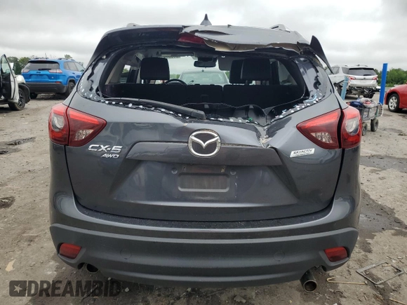 2016 Mazda CX-5 Grand Touring z VIN JM3KE4DY5G0741800, wystawiony jako Copart lot #58565455 z przebiegiem 33 675 mil mil oraz Szkoda całkowita • Salvage title. Historia ofert i sprzedaży dostępna na DreamBid. Obrazek 6.