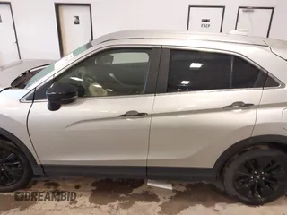 2022 Mitsubishi Eclipse Cross LE z VIN JA4ASVAA7NZ054234, wystawiony jako IAAI lot #42325344 z przebiegiem 36 118 mil mil oraz . Historia ofert i sprzedaży dostępna na DreamBid. Obrazek 13.