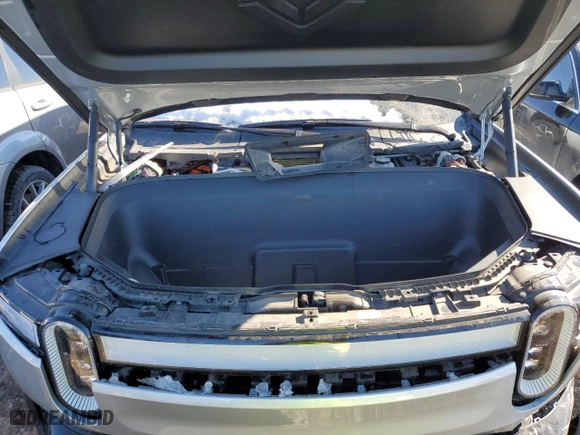 2023 Rivian R1T Adventure with VIN 7FCTGAAA5PN017311, listed as a Copart auction lot 42523755 with 35,039 mi miles and Salvage Title. Bid and sale history available at carsss.com. Image 12.