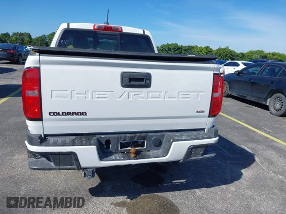 2021 Chevrolet Colorado 2WD LT z VIN 1GCGSCEN3M1276560, wystawiony jako IAAI lot #41442039 z przebiegiem 82 538 mil mil oraz . Historia ofert i sprzedaży dostępna na DreamBid. Obrazek 16.