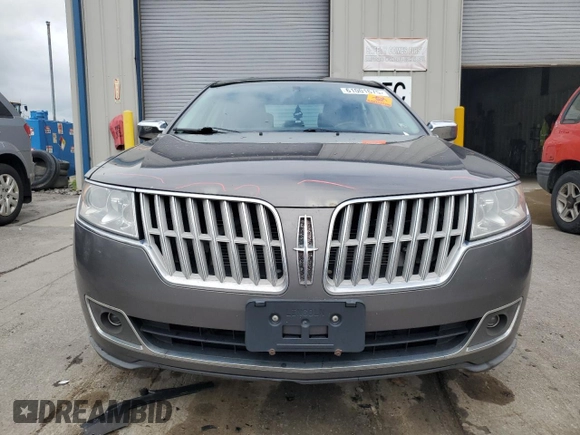 2012 Lincoln MKZ with VIN 3LNHL2JC1CR808663, listed as a Copart auction lot 61001675 with 153,627 mi miles and Salvage title. Bid and sale history available at DreamBid. Image 5.