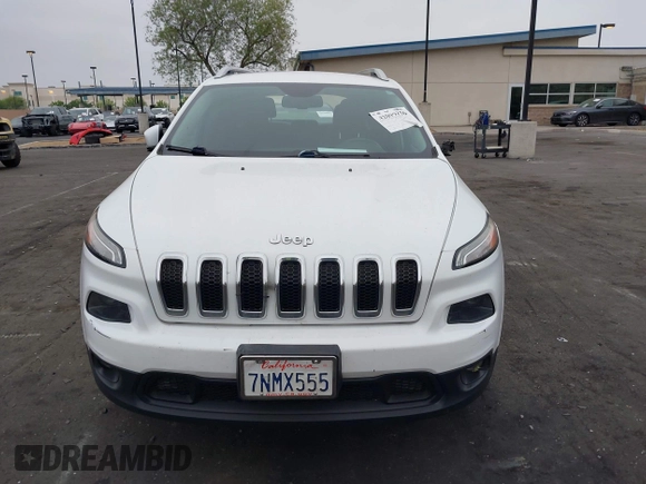 2015 Jeep Cherokee Latitude with VIN 1C4PJLCB0FW761871, listed as a IAAI auction lot 42099336 with 213,049 mi miles and . Bid and sale history available at DreamBid. Image 13.