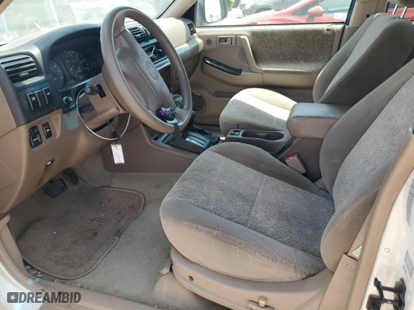 2001 Isuzu Rodeo S with VIN 4S2DM58W414330847, listed as a Copart auction lot 64028134 with 160,027 mi miles and Clean Title. Bid and sale history available at carsss.com. Image 7.