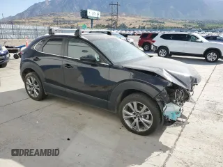 2023 Mazda CX-30 S Carbon Edition with VIN 3MVDMBCM6PM504431, listed as a Copart auction lot 61154795 with 90,396 mi miles and Salvage title. Bid and sale history available at DreamBid. Image 4.