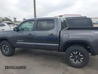 2018 Toyota Tacoma SR with VIN 5TFCZ5AN6JX127774, listed as a IAAI auction lot 41801158 with 28,161 mi miles and . Bid and sale history available at DreamBid. Image 14.