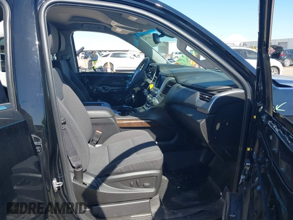 2018 Chevrolet Tahoe LS with VIN 1GNSCAKC5JR224799, listed as a IAAI auction lot 41761362 with 43,016 mi miles and . Bid and sale history available at DreamBid. Image 5.