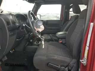 2012 Jeep Wrangler Unlimited Rubicon with VIN 1C4HJWFG2CL219021, listed as a Copart auction lot 87451784 with 109,675 mi miles and Salvage title. Bid and sale history available at DreamBid. Image 7.