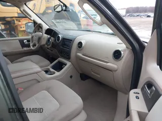 2004 Ford Expedition Special Service with VIN 1FMPU16L64LB74097, listed as a IAAI auction lot 41938850 with 168,436 mi miles. Bid and sale history available at carsss.com. Image 5.
