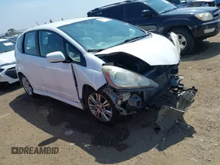 2009 Honda Fit Sport z VIN JHMGE884X9S031777, wystawiony jako IAAI lot #42482823 z przebiegiem 317 667 mil mil oraz . Historia ofert i sprzedaży dostępna na DreamBid. Obrazek 1.