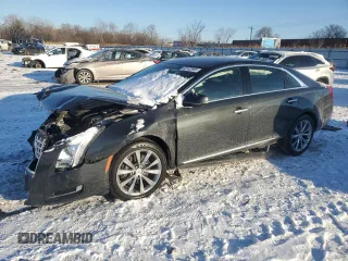 2014 Cadillac XTS with VIN 2G61L5S37E9185986, listed as a Copart auction lot 45142685 with 61,940 mi miles and Salvage Title. Bid and sale history available at carsss.com. Image 1.