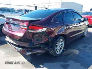 2017 Ford Fusion Energi SE with VIN 3FA6P0PU5HR274892, listed as a IAAI auction lot 41823526 with 188,746 mi miles. Bid and sale history available at carsss.com. Image 4.