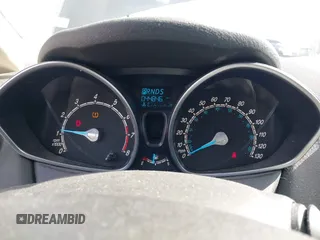 2014 Ford Fiesta SE with VIN 3FADP4BJ1EM199936, listed as a IAAI auction lot 41988670 with 44,846 mi miles and . Bid and sale history available at DreamBid. Image 7.