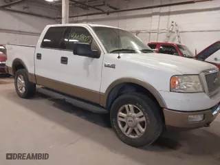 2004 Ford F-150 XLT with VIN 1FTPW14594KC38528, listed as a IAAI auction lot 42058053 with 238,756 mi miles. Bid and sale history available at carsss.com. Image 1.
