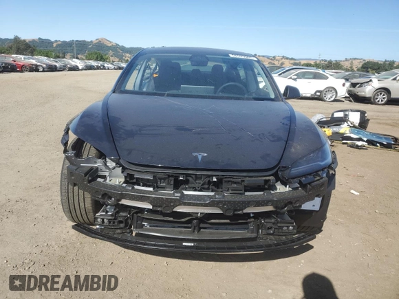 2025 Tesla Model 3 Long Range with VIN 5YJ3E1EA4SF978477, listed as a Copart auction lot 58525905 with 1,531 mi miles and Salvage title. Bid and sale history available at DreamBid. Image 5.