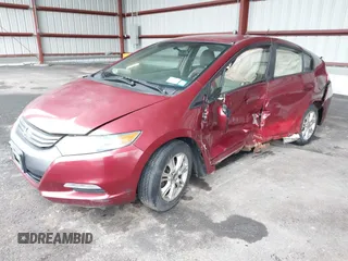 2010 Honda Insight EX with VIN JHMZE2H74AS033674, listed as a IAAI auction lot 41953858 with 144,018 mi miles and . Bid and sale history available at DreamBid. Image 2.