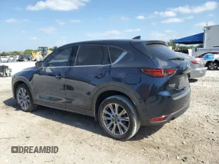2021 Mazda CX-5 Grand Touring with VIN JM3KFBDM4M1462570, listed as a Copart auction lot 54827675 with 45,389 mi miles and Salvage Title. Bid and sale history available at DreamBid. Image 2.