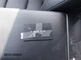 2021 Tesla Model 3 Standard Range Plus z VIN 5YJ3E1EA1MF059829, wystawiony jako IAAI lot #41700782 z przebiegiem 36 813 mil mil oraz . Historia ofert i sprzedaży dostępna na DreamBid. Obrazek 11.