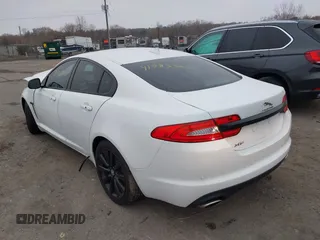 2014 Jaguar XF SC with VIN SAJWA0EX0E8U09381, listed as a IAAI auction lot 41783386 with 27,730 mi miles and . Bid and sale history available at DreamBid. Image 3.