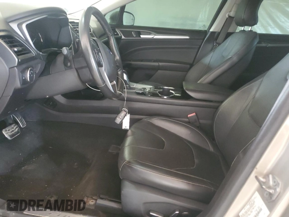 2016 Ford Fusion Titanium z VIN 3FA6P0K96GR117597, wystawiony jako Copart lot #62072525 z przebiegiem Nie podano mil oraz Czysty tytuł • Clean title. Historia ofert i sprzedaży dostępna na DreamBid. Obrazek 7.