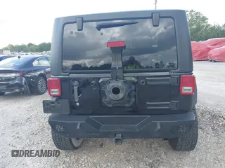 2012 Jeep Wrangler Sport z VIN 1C4AJWAG2CL286680, wystawiony jako IAAI lot #42434411 z przebiegiem 97 142 mil mil oraz . Historia ofert i sprzedaży dostępna na DreamBid. Obrazek 16.