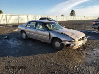 1999 Buick LeSabre Limited with VIN 1G4HR52KXXH452758, listed as a Copart auction lot 85077744 with 211,060 mi miles and Salvage Title. Bid and sale history available at DreamBid. Image 4.