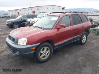 2004 Hyundai Santa Fe GLS with VIN KM8SC73DX4U640640, listed as a IAAI auction lot 41803501 with 149,924 mi miles. Bid and sale history available at carsss.com. Image 2.