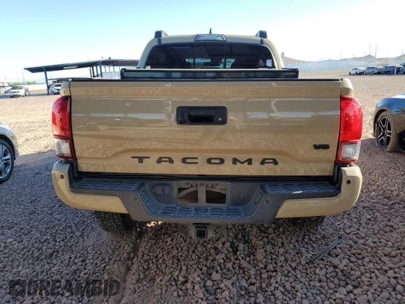 2019 Toyota Tacoma SR z VIN 5TFCZ5AN8KX171793, wystawiony jako Copart lot #57907015 z przebiegiem 96 925 mil mil oraz Szkoda całkowita • Salvage title. Historia ofert i sprzedaży dostępna na DreamBid. Obrazek 6.