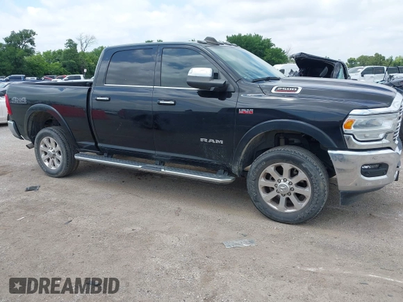 2022 Ram 2500 Laramie with VIN 3C6UR5FJ2NG305658, listed as a IAAI auction lot 42362662 with 50,701 mi miles and . Bid and sale history available at DreamBid. Image 13.