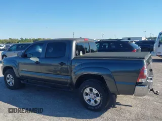 2009 Toyota Tacoma PreRunner with VIN 3TMJU62N59M088137, listed as a IAAI auction lot 41775410 with 217,331 mi miles. Bid and sale history available at carsss.com. Image 14.