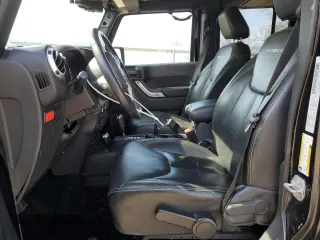 2016 Jeep Wrangler Unlimited Rubicon with VIN 1C4HJWFG4GL107777, listed as a Copart auction lot 48974135 with 118,164 mi miles and Salvage Title. Bid and sale history available at carsss.com. Image 7.