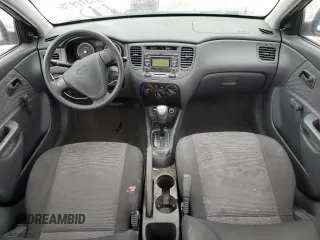 2009 Kia Rio LX with VIN KNADE223396443465, listed as a Copart auction lot 51370975 with 110,952 mi miles and Salvage Title. Bid and sale history available at carsss.com. Image 8.