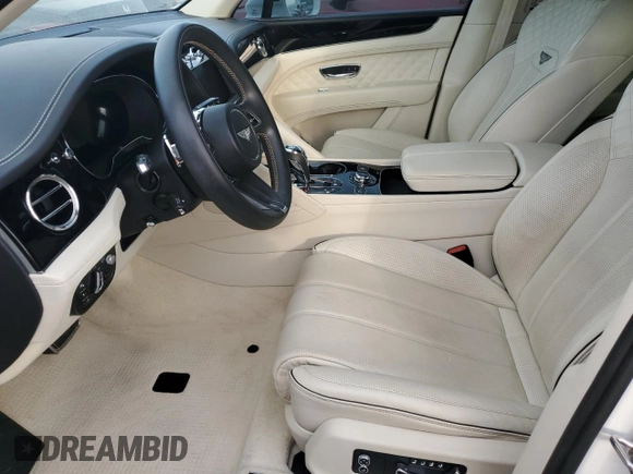 2022 Bentley Bentayga V8 z VIN SJAAM2ZV4NC011285, wystawiony jako Copart lot #75246624 z przebiegiem 33 179 mil mil oraz Nie do naprawy. Historia ofert i sprzedaży dostępna na DreamBid. Obrazek 7.
