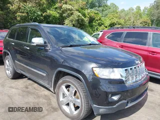 2013 Jeep Grand Cherokee Overland with VIN 1C4RJECT3DC526005, listed as a IAAI auction lot 42064151 with 112,777 mi miles and . Bid and sale history available at DreamBid. Image 1.