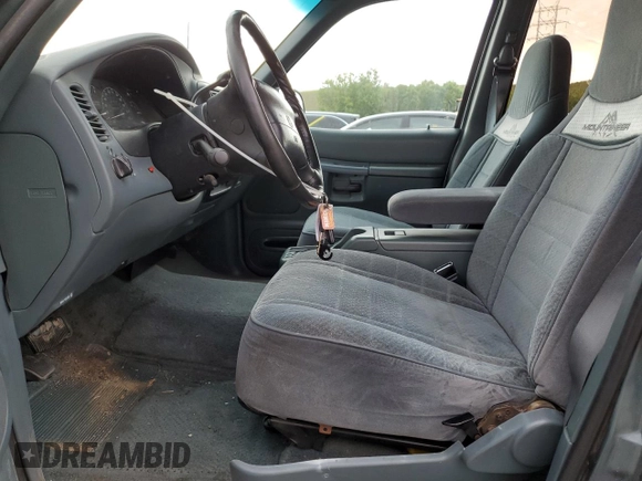 1997 Mercury Mountaineer with VIN 4M2DU55P3VUJ08261, listed as a Copart auction lot 59320875 with 168,804 mi miles and Salvage title. Bid and sale history available at DreamBid. Image 7.
