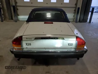 1989 Jaguar XJS z VIN SAJNV4847KC164497, wystawiony jako Copart lot #87258504 z przebiegiem 90 299 mil mil oraz Szkody całkowita. Historia ofert i sprzedaży dostępna na DreamBid. Obrazek 6.
