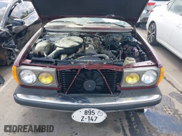 1985 Mercedes-Benz 300 with VIN WDBAB33CXFA233598, listed as a IAAI auction lot 41975316 with 149,707 mi miles and . Bid and sale history available at DreamBid. Image 10.