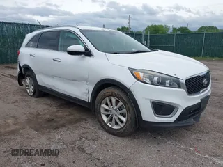 2016 Kia Sorento LX with VIN 5XYPG4A36GG035639, listed as a IAAI auction lot 42140364 with 142,711 mi miles. Bid and sale history available at carsss.com. Image 1.