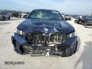 2025 BMW X6 M60i with VIN 5UX43EX01S9X19069, listed as a Copart auction lot 42613105 with 6,909 mi miles and Salvage Title. Bid and sale history available at carsss.com. Image 5.