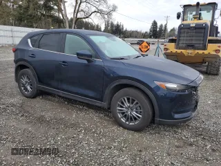 2017 Mazda CX-5 Touring with VIN JM3KFBCL4H0181101, listed as a Copart auction lot 45736515 with 89,354 mi miles and Salvage Title. Bid and sale history available at carsss.com. Image 4.