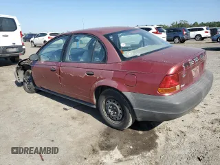 1997 Saturn SL with VIN 1G8ZF5285VZ412630, listed as a Copart auction lot 74937694 with 165,371 mi miles and Salvage Title. Bid and sale history available at carsss.com. Image 2.