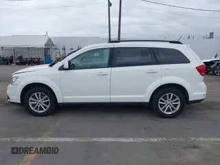 2015 Dodge Journey SXT with VIN 3C4PDDBG9FT606686, listed as a IAAI auction lot 42048201 with 107,593 mi miles and . Bid and sale history available at DreamBid. Image 14.