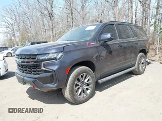 2023 Chevrolet Tahoe Z71 with VIN 1GNSKPKD7PR255074, listed as a IAAI auction lot 41891917 with 37,091 mi miles and . Bid and sale history available at DreamBid. Image 2.