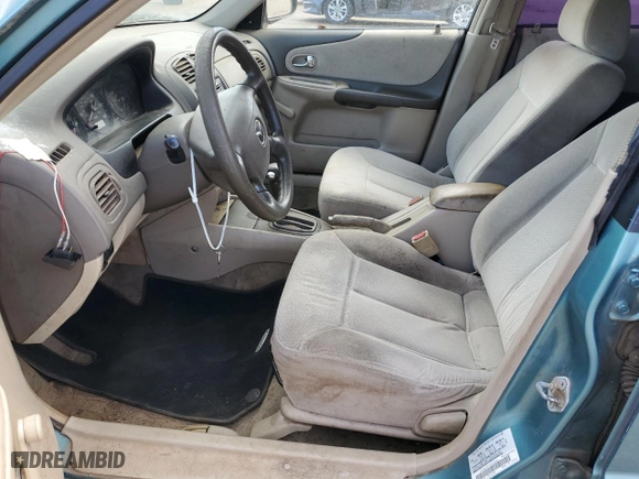 2001 Mazda Protege DX with VIN JM1BJ222310433605, listed as a Copart auction lot 49156215 with 205,146 mi miles and Salvage Title. Bid and sale history available at carsss.com. Image 7.