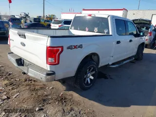 2015 Ford F-150 XLT w/HD Payload Pkg with VIN 1FTFW1EG7FFB09470, listed as a IAAI auction lot 41455246 with 152,766 mi miles. Bid and sale history available at carsss.com. Image 4.